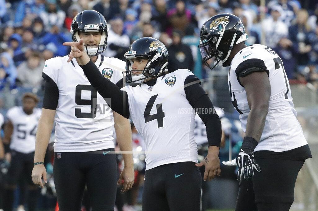 James Kenney Jacksonville Jaguars place kicker Josh Lambo (4) watches his 49-yard field goal against the Tennessee Titans in the first half of an NFL football game Sunday, Nov. 24, 2019, in Nashville, Tenn. (AP Photo/James Kenney)