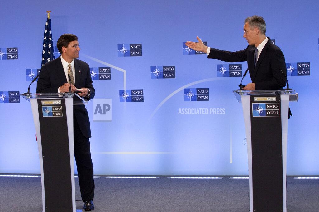 Virginia Mayo U.S. Secretary of Defense Mark Esper, left, and NATO Secretary General Jens Stoltenberg participate in a joint press conference at NATO headquarters in Brussels, Friday, June 26, 2020. U.S. Secretary of Defense Mark Esper is at NATO to follow-up on a broad range of issues raised during last week's NATO defense ministerial. (AP Photo/Virginia Mayo, Pool)