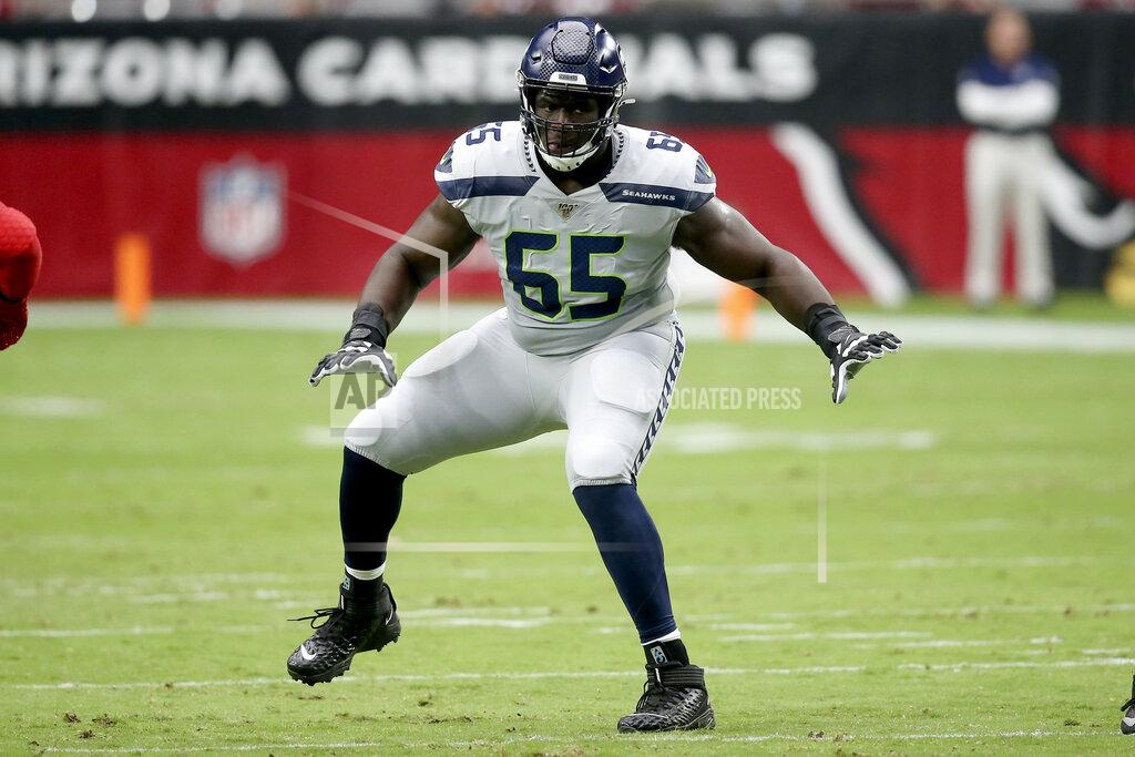 Ross D. Franklin Seattle Seahawks offensive tackle Germain Ifedi (65) runs a play against the Arizona Cardinals during the first half of an NFL football game, Sunday, Sept. 29, 2019, in Glendale, Ariz. (AP Photo/Ross D. Franklin)