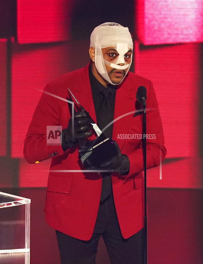 Chris Pizzello The Weeknd accepts the award for favorite soul R&B song for "Heartless" at the American Music Awards on Sunday, Nov. 22, 2020, at the Microsoft Theater in Los Angeles. (AP Photo/Chris Pizzello)