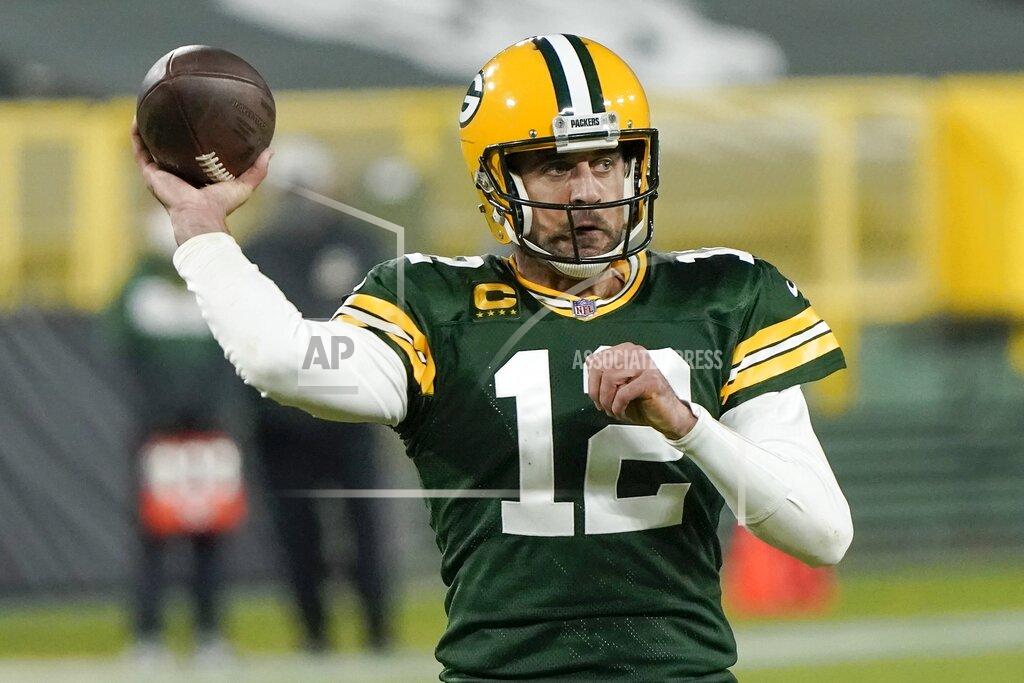 Morry Gash Green Bay Packers' Aaron Rodgers throws a touchdown pass during the second half of an NFL football game against the Philadelphia Eagles Sunday, Dec. 6, 2020, in Green Bay, Wis. The pass was Rodgers' 400th career touchdown pass. (AP Photo/Morry Gash)
