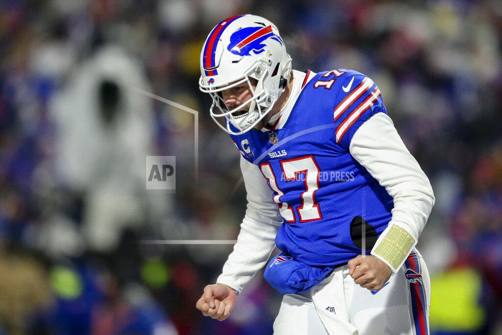 Joshua Bessex Buffalo Bills quarterback Josh Allen (17) reacts after wide receiver Emmanuel Sanders (1) catches a touchdown pass during the second half of an NFL wild-card playoff football game against the New England Patriots, Saturday, Jan. 15, 2022, in Orchard Park, N.Y. (AP Photo/Joshua Bessex)