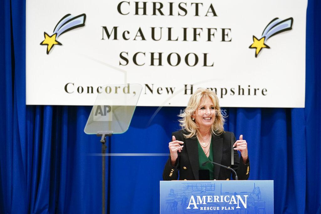 Susan Walsh First lady Jill Biden speaks as she visits the Christa McAuliffe School in Concord, N.H., Wednesday, March 17, 2021, to pay tribute to the New Hampshire woman chosen 35 years ago to be America's "Teacher in Space" and to emphasize that the $1.9 trillion COVID-19 relief plan signed into law by President Joe Biden last week will provide funding for the reopening of schools. (AP Photo/Susan Walsh, Pool)