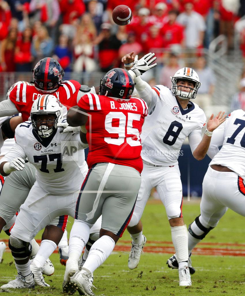 Rogelio V. Solis Auburn quarterback Jarrett Stidham (8) passes over Mississippi defensive tackle Benito Jones (95) during the first half of an NCAA college football game on Saturday, Oct. 20, 2018, in Oxford, Miss. Auburn won 31-16. (AP Photo/Rogelio V. Solis)