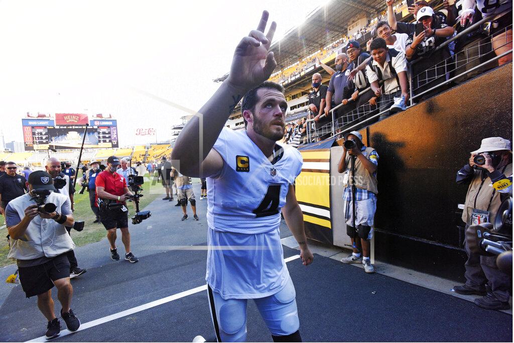 Don Wright Las Vegas Raiders quarterback Derek Carr (4) waves to fans as he heads to the locker room following an NFL football game against the Pittsburgh Steelers in Pittsburgh, Sunday, Sept. 19, 2021. (AP Photo/Don Wright)