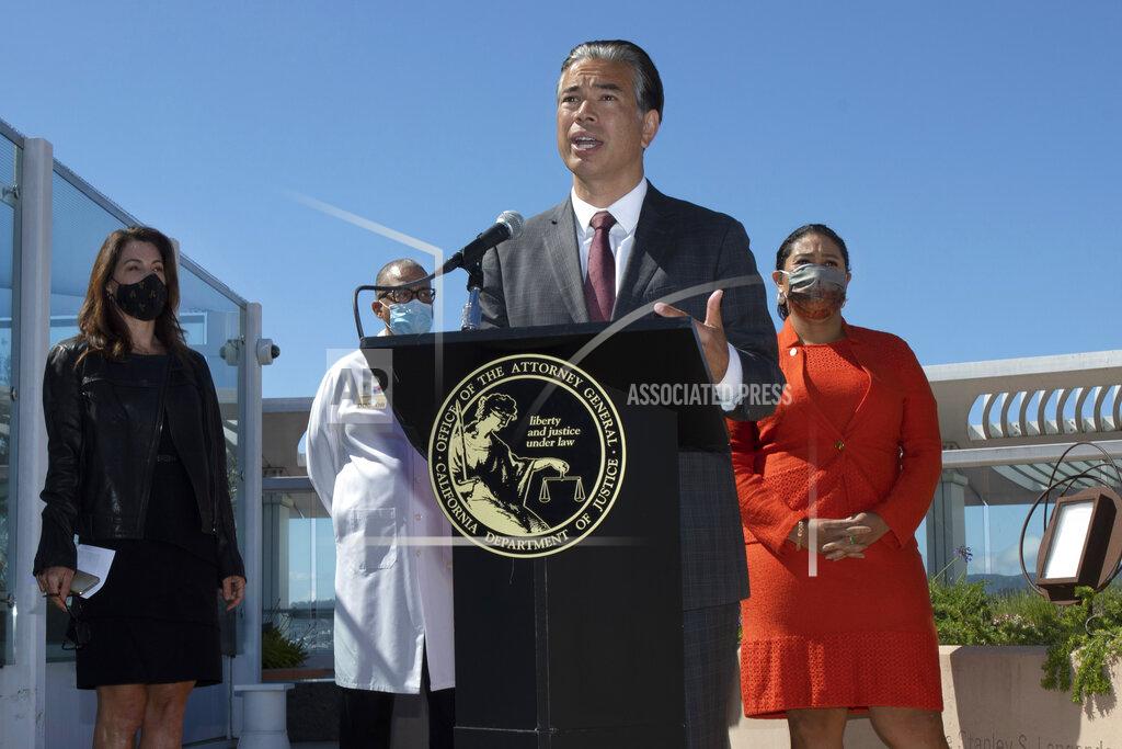 Karl Mondon California Attorney General Rob Bonta announces that the state is appealing a recent decision by a federal judge to overturn a ban on assault weapons during a news conference at Zuckerberg General Hospital in San Francisco, Thursday, June 10, 2021. He was joined by Robyn Thomas of the Giffords Law Center, Dr. Andre Campbell of San Francisco General Hospital and San Francisco Mayor London Breed. (Karl Mondon/Bay Area News Group via AP)