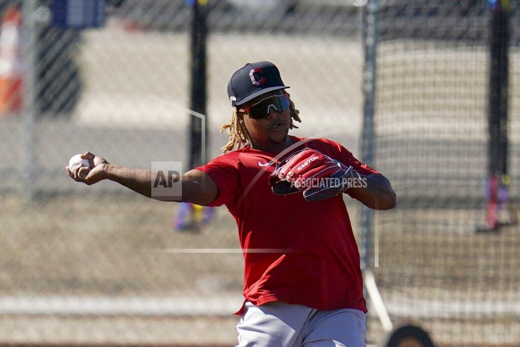 Ross D. Franklin Cleveland Indians third baseman Jose Ramirez throws to second base during a spring training baseball practice Monday, Feb. 22, 2021, in Goodyear, Ariz. Indians star third baseman José Ramírez and slugger Franmil Reyes have rejoined the team after being banned for breaking COVID-19 protocols. The players tested negative for the virus Tuesday, March 9, 2021, and were back at the team's facility in Goodyear, Arizona.(AP Photo/Ross D. Franklin)
