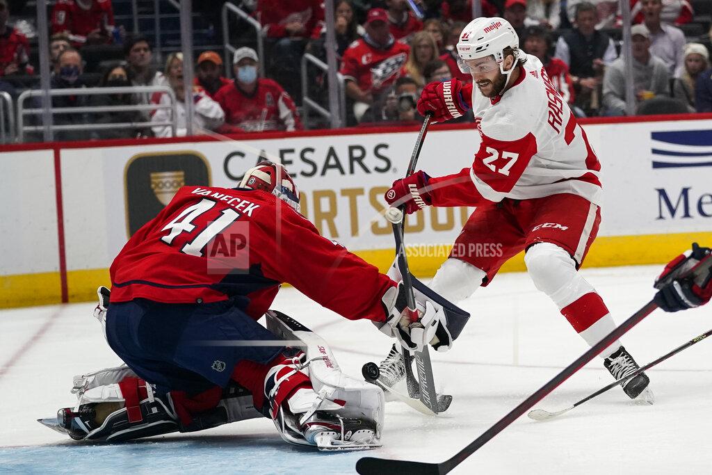 Alex Brandon Washington Capitals goaltender Vitek Vanecek (41) blocks a shot by Detroit Red Wings center Michael Rasmussen (27) in the first period of an NHL hockey game, Wednesday, Oct. 27, 2021, in Washington. (AP Photo/Alex Brandon)