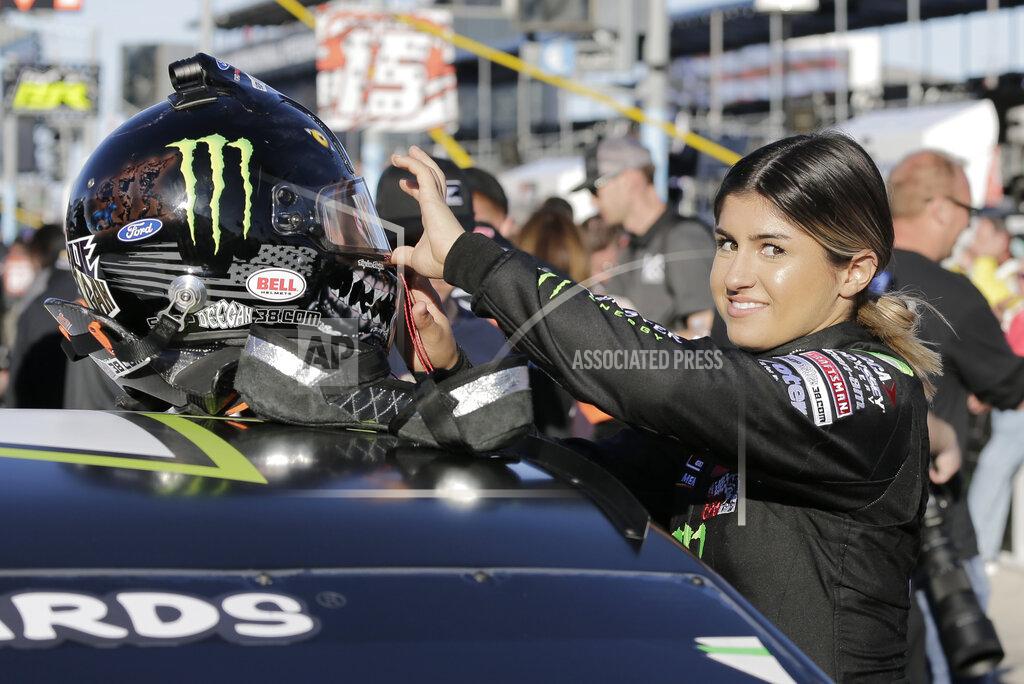 Terry Renna Driver Hailie Deegan prepares her helmet before the start of the ARCA auto race at Daytona International Speedway, Saturday, Feb. 8, 2020, in Daytona Beach, Fla. (AP Photo/Terry Renna)