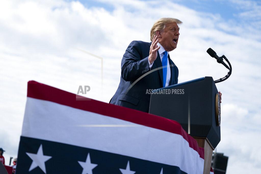 Evan Vucci President Donald Trump speaks during a campaign rally at Pitt-Greenville Airport, Thursday, Oct. 15, 2020, in Greenville, N.C. (AP Photo/Evan Vucci)