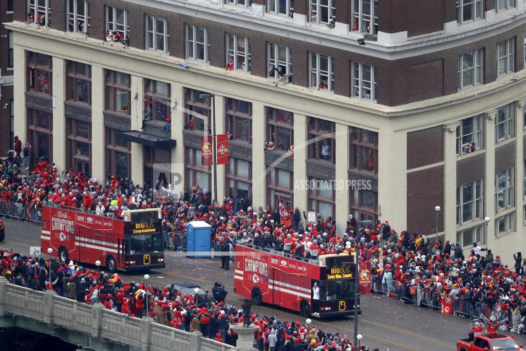 Charlie Riedel Busses carrying members of the Kansas City Chiefs travel in a parade through downtown Kansas City, Mo., Wednesday, Feb. 5, 2020, to celebrate the Chiefs victory in the NFL's Super Bowl 54. (AP Photo/Charlie Riedel)