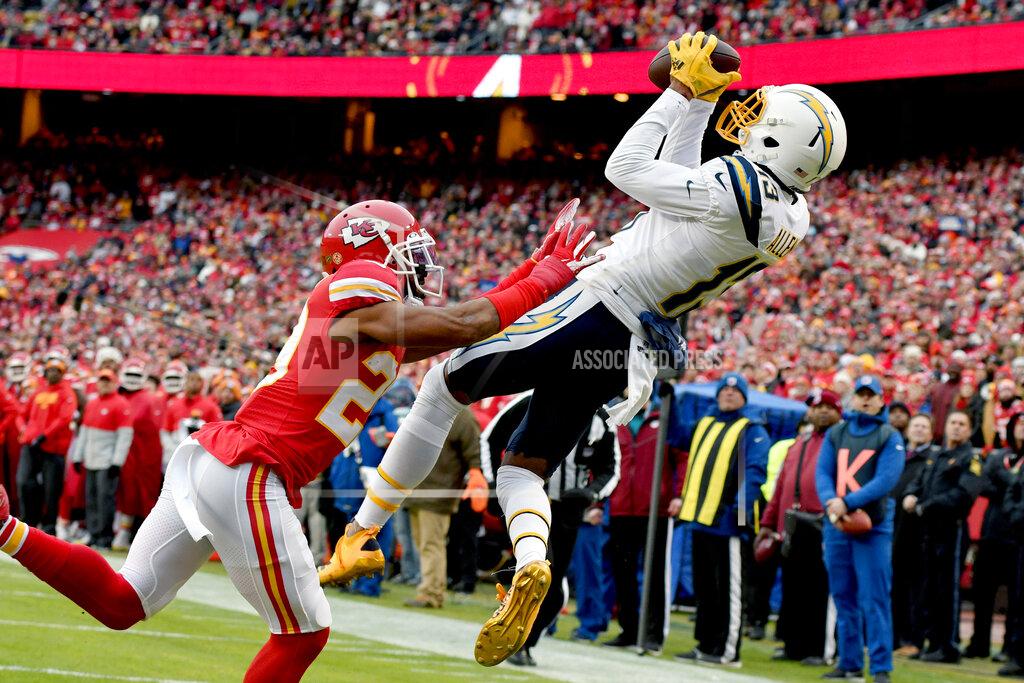 Ed Zurga Los Angeles Chargers wide receiver Keenan Allen (13) makes a touchdown catch against Kansas City Chiefs cornerback Kendall Fuller (29) during the first half of an NFL football game in Kansas City, Mo., Sunday, Dec. 29, 2019. (AP Photo/Ed Zurga)