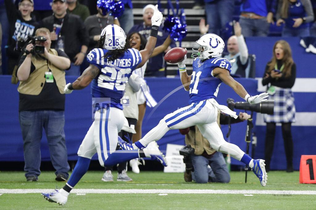 Michael Conroy Indianapolis Colts' Nyheim Hines (21) celebrates as he runs back a punt for a touchdown during the second half of an NFL football game against the Carolina Panthers, Sunday, Dec. 22, 2019, in Indianapolis. (AP Photo/Michael Conroy)