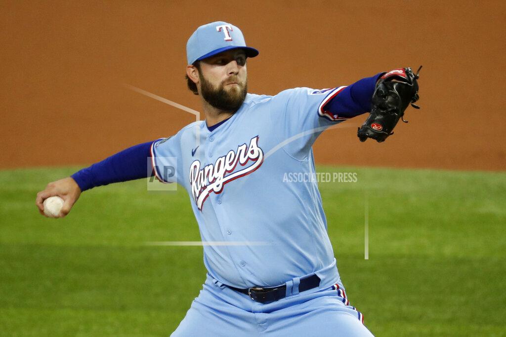 Roger Steinman Texas Rangers starting pitcher Jordan Lyles works against the Houston Astros during the first inning of a baseball game in Arlington, Texas, Sunday, Sept. 27, 2020. (AP Photo/Roger Steinman)