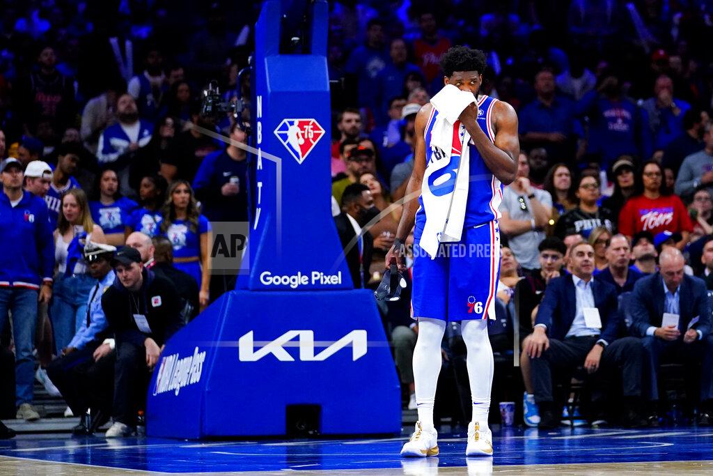 Matt Slocum Philadelphia 76ers' Joel Embiid wipes his face during the second half of Game 6 of an NBA basketball second-round playoff series against the Miami Heat, Thursday, May 12, 2022, in Philadelphia. (AP Photo/Matt Slocum)