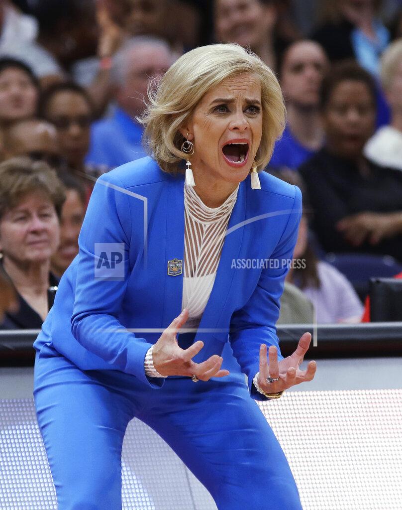 Chris O'meara FILE - In this April 7, 2019 file photo, Baylor coach Kim Mulkey encourages her team during the first half against Notre Dame in the Final Four championship game of the NCAA women's college basketball tournament in Tampa, Fla. Mulkey is part of a nine-person group announced Saturday, April 4, 2020, as this year’s class of enshrinees into the Naismith Memorial Basketball Hall of Fame. (AP Photo/Chris O'Meara, File)