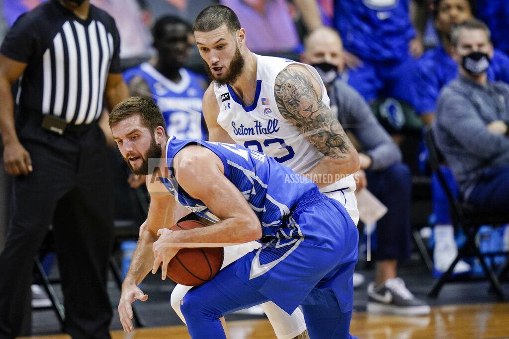 Frank Franklin Ii Seton Hall's Sandro Mamukelashvili (23) defends Creighton's Mitch Ballock (24) during the second half of an NCAA college basketball game Wednesday, Jan. 27, 2021, in Newark, N.J. Creighton won 85-81. (AP Photo/Frank Franklin II)