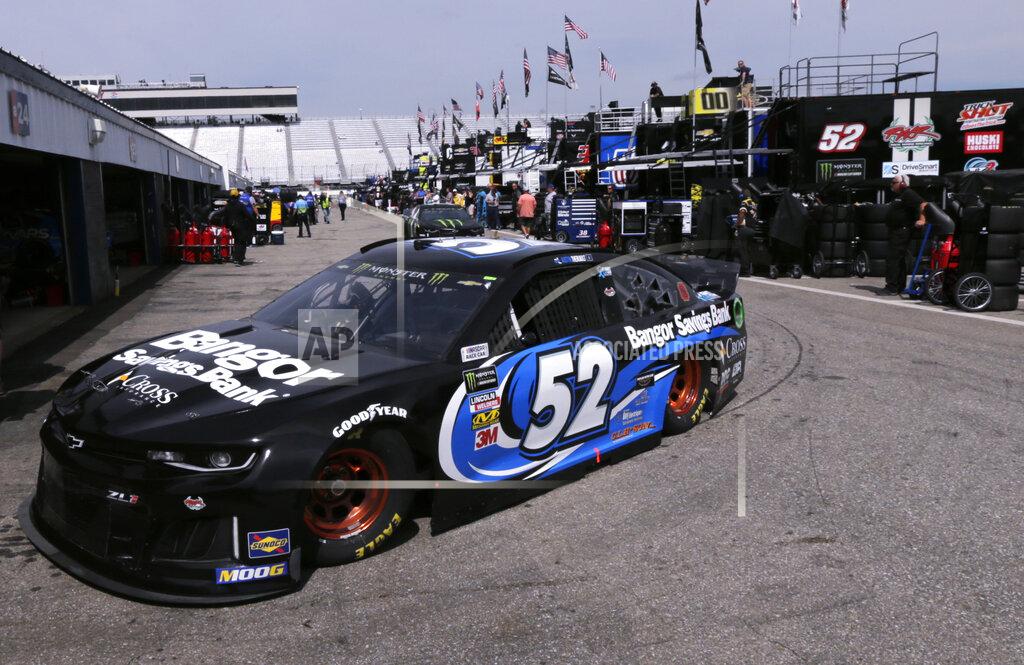 Charles Krupa Austin Theriault heads to his garage during a NASCAR Cup Series auto race practice at New Hampshire Motor Speedway in Loudon, N.H., Saturday, July 20, 2019. (AP Photo/Charles Krupa)
