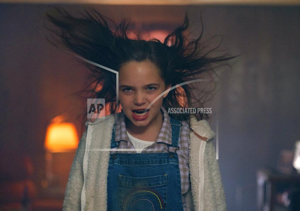 Ken Woroner This image released by Universal Pictures shows Ryan Kiera Armstrong as Charlie in a scene from "Firestarter." (Ken Woroner/Universal Pictures via AP)