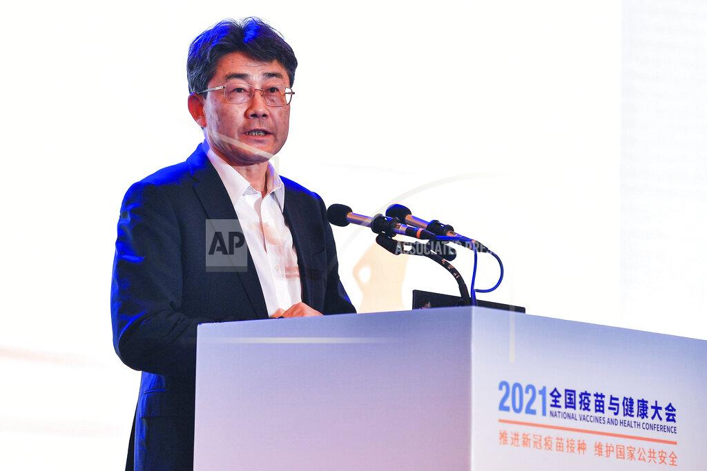 Uncredited Gao Fu, director of the China Centers for Disease Control, speaks at the National Vaccines and Health conference in Chengdu in southwest China's Sichuan province Saturday, April 10, 2021. In a rare admission of the weakness of Chinese coronavirus vaccines, Gao the country's top disease control official says their effectiveness is low and the government is considering mixing them to give them a boost. (Chinatopix Via AP)