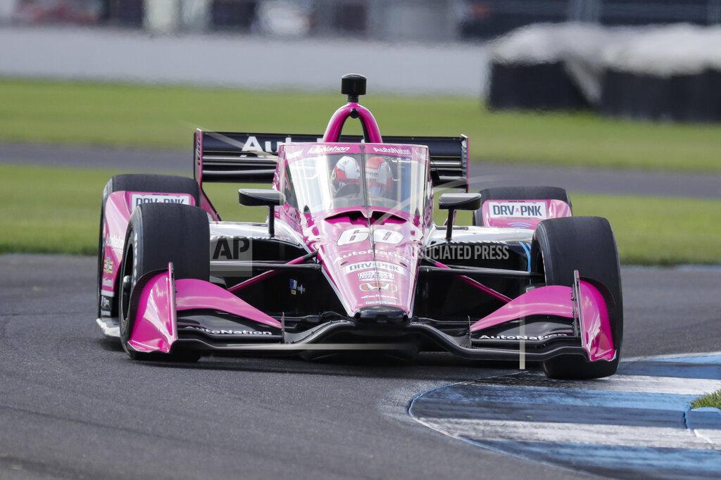 Darron Cummings Race driver Jack Harvey, of Great Britain, drives through a turn during qualifying for the IndyCar auto race at Indianapolis Motor Speedway in Indianapolis, Friday, July 3, 2020. (AP Photo/Darron Cummings)