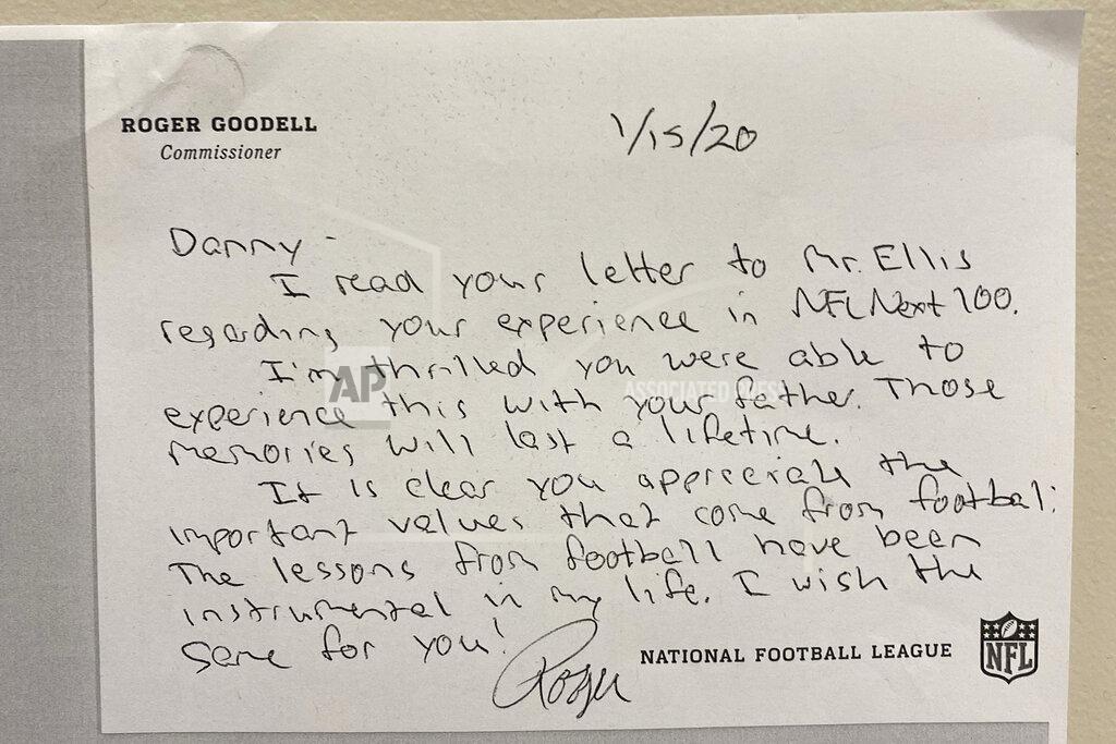 This undated image provided by the NFL, shows a hand written note from NFL Commissioner Roger Goodell to sixth-grader Danny Speski from Chicago. Speski received an autographed football from New York Giants running back Saquon Barkley and a handwritten letter from NFL Commissioner Roger Goodell, after Speski wrote to the league about his experience entering a Super Bowl contest. (NFL via AP)