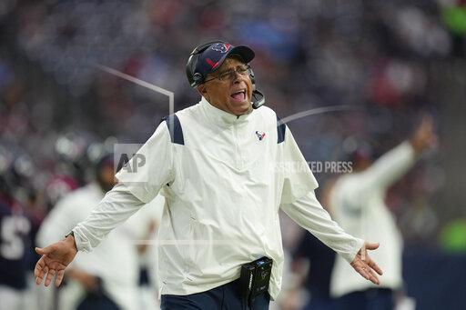 Houston Texans head coach David Culley questions a call during the first half of an NFL football game against the Tennessee Titans, Sunday, Jan. 9, 2022, in Houston. (AP Photo/Eric Christian Smith)