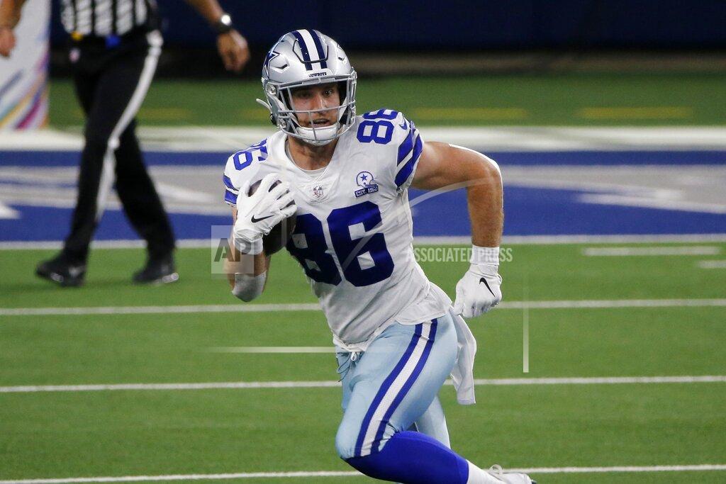 Michael Ainsworth Dallas Cowboys tight end Dalton Schultz (86) gains short yardage after catching a pass in the first half of an NFL football game against the Arizona Cardinals in Arlington, Texas, Monday, Oct. 19, 2020. (AP Photo/Michael Ainsworth)