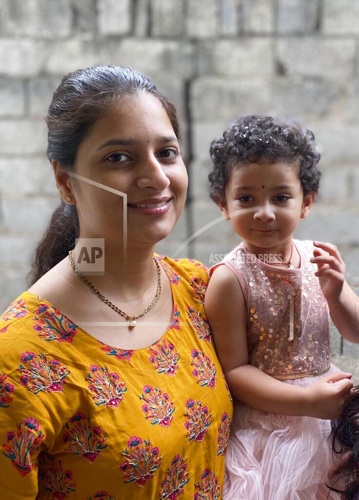 Bindu Takkalapally Arpana Takkalapally, wife of Sandeep Vudayagiri, a big data analytics engineer in Dallas, poses with her daughter Ridhi Vudayagiri, in Hyderabad, India, Thursday, July 2, 2020. Takkalapally with her daughter are stranded in Hyderabad since February, though she holds an H-4 visa, given to immediate family of H-1B visa holders, but without a renewal stamp from a U.S. consulate, she can't go back to her husband in Dallas, following an executive order signed by President Donald Trump that suspends applications for H-1B and other high-skilled work visas from abroad. (AP Photo/Bindu Takkalapally)