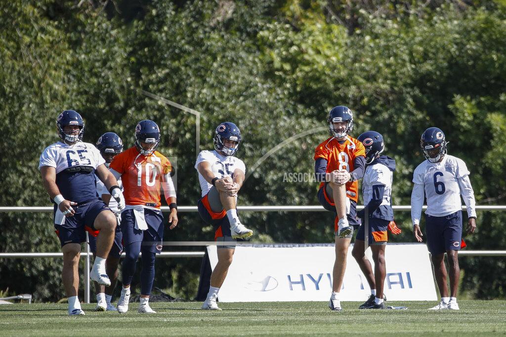 Kamil Krzaczynski Chicago Bears quarterback Tyler Bray (8) and running back Ryan Nall (35) stretch during NFL football training camp at Halas Hall on Thursday, Sept. 3, 2020, in Lake Forest, Ill. (Kamil Krzaczynski/USA TODAY Sports via AP, Pool)