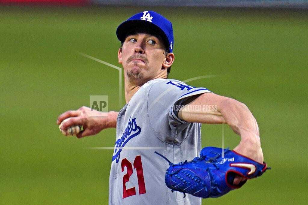 Gene J. Puskar Los Angeles Dodgers starting pitcher Walker Buehler winds up during the third inning of the team's baseball game against the Pittsburgh Pirates in Pittsburgh, Tuesday, June 8, 2021. (AP Photo/Gene J. Puskar)
