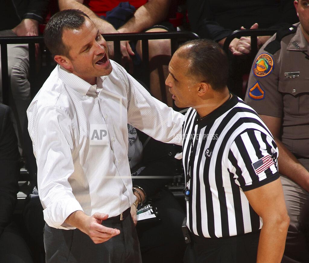 Phil Sears Louisville coach Jeff Walz argues with official Billy Smith during the first half of the team's NCAA college basketball game against Florida State in Tallahassee, Fla., Thursday, Jan. 24, 2019. (AP Photo/Phil Sears)