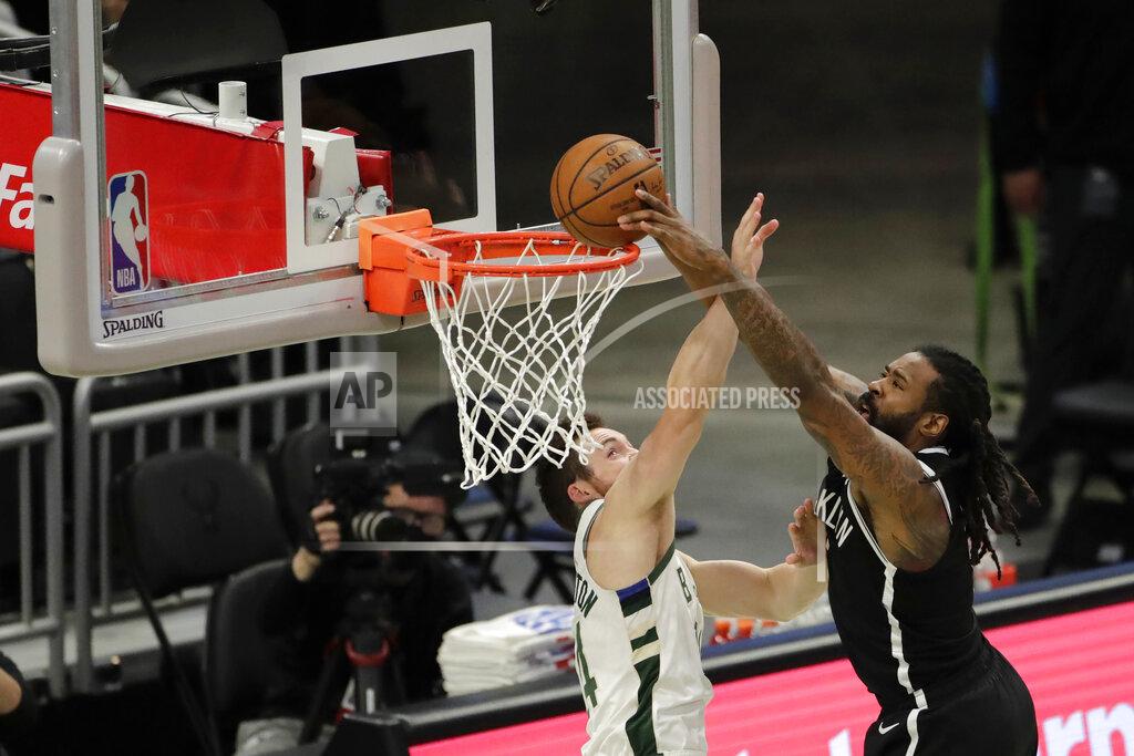 Aaron Gash Brooklyn Nets' DeAndre Jordan is fouled by Milwaukee Bucks' Pat Connaughton as he attempts a shot during the first half of an NBA basketball game Tuesday, May 4, 2021, in Milwaukee. (AP Photo/Aaron Gash)