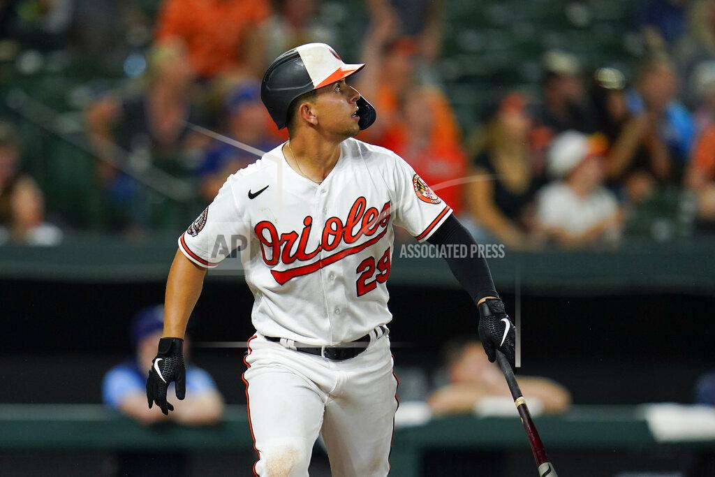 Julio Cortez Baltimore Orioles' Ramon Urias watches his ball while hitting a two-run home run against Tampa Bay Rays relief pitcher Colin Poche during the eighth inning of a baseball game, Tuesday, July 26, 2022, in Baltimore. Orioles' Adley Rutschman scored on the home run. The Orioles won 5-3. (AP Photo/Julio Cortez)