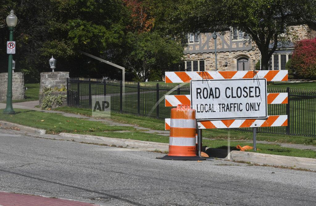 Matthew Dae Smith Barriers seen blocking traffic on Moores River Drive that leads toward the cul-de-sac near the Governor's Mansion on Thursday, Oct. 8, 2020 in Lansing, Mich. Six people plotted to kidnap Michigan Democratic Gov. Gretchen Whitmer at her vacation home. That's according to a criminal complaint unsealed Thursday. (Matthew Dae Smith/Lansing State Journal via AP)