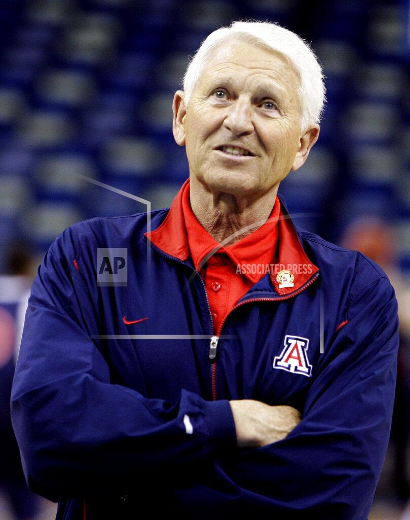 Alex Brandon FILE - In this March 15, 2007, file photo, Arizona coach Lute Olson watches his team practice for the NCAA Midwest Regional basketball tournament in New Orleans. Olson, the Hall of Fame coach who turned Arizona into a college basketball powerhouse, has died at the age of 85. Olson’s family said he died Thursday, Aug. 27, 2020. The family did not provide the cause of death. (AP Photo/Alex Brandon, File)
