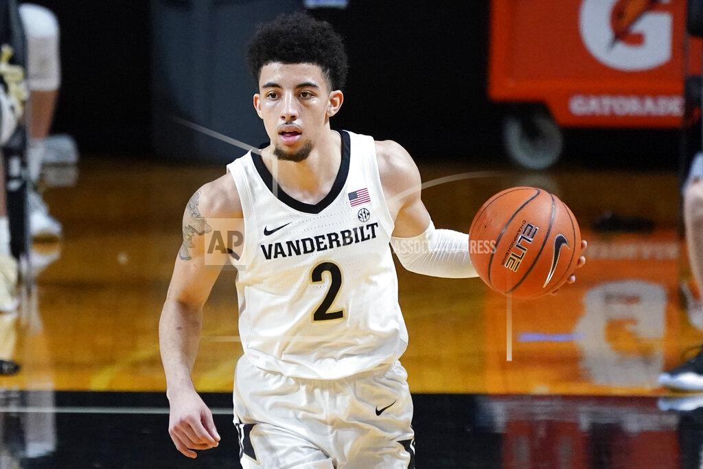 Mark Humphrey FILE - In this Jan. 9, 2021, file photo, Vanderbilt guard Scotty Pippen Jr. (2) brings the ball downcourt against Mississippi State in the first half of an NCAA college basketball game in Nashville, Tenn. Pippen Jr. gets a personalized critique after each game from people who know him and basketball very well. (AP Photo/Mark Humphrey, File)