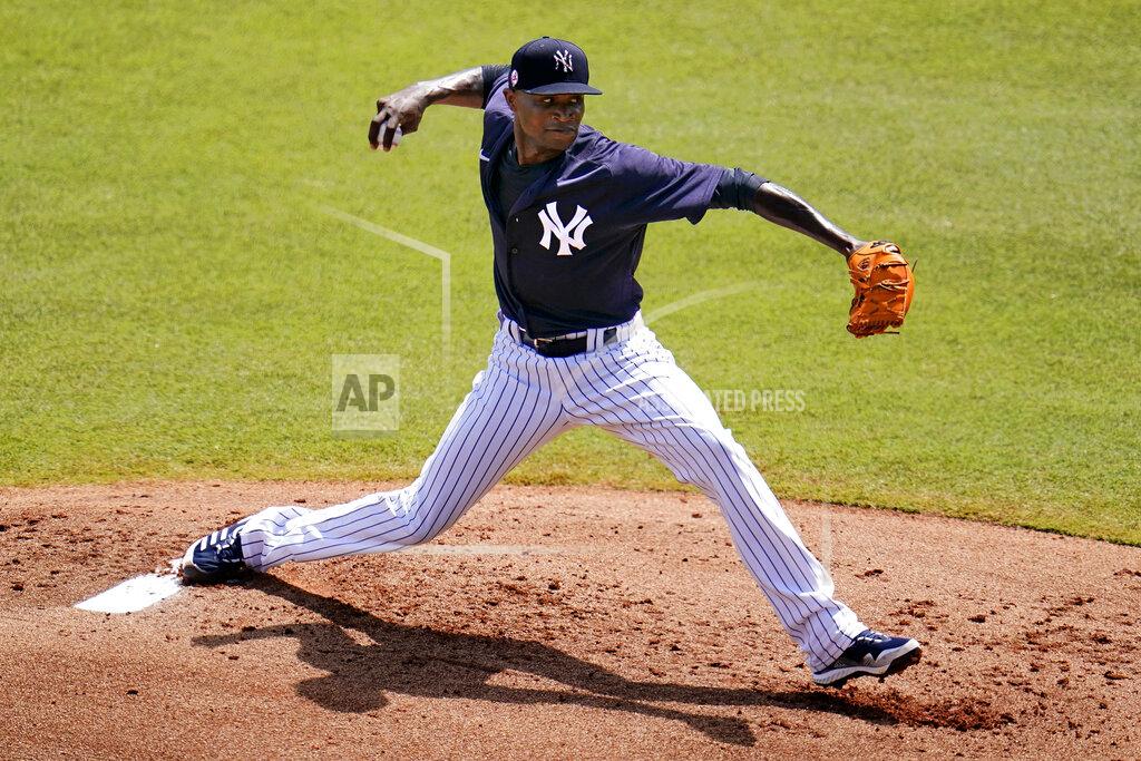 Gene J. Puskar New York Yankees' pitcher Domingo German delivers during the first inning of a spring training exhibition baseball game against the Philadelphia Phillies in Tampa, Fla., Monday, March 15, 2021. (AP Photo/Gene J. Puskar)