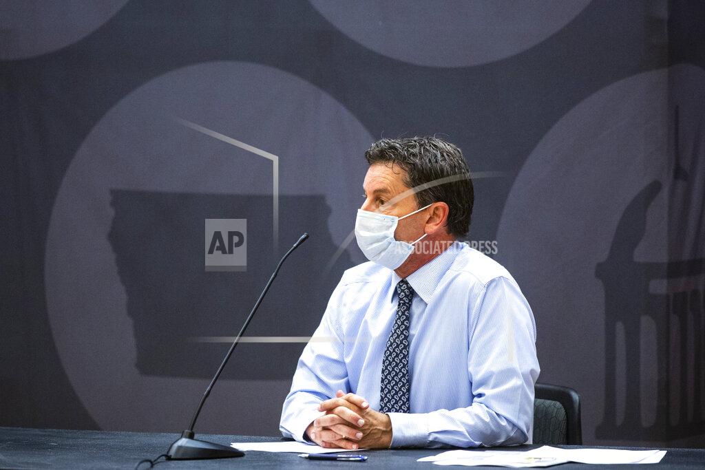 Joseph Cress Kevin Kregel, interim provost and executive vice president, wears a face mask while speaking during a news conference amid the novel coronavirus pandemic, Monday, Aug. 10, 2020, at the Iowa Memorial Union on the University of Iowa campus in Iowa City, Iowa. (Joseph Cress/Iowa City Press-Citizen via AP)