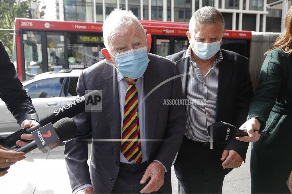 Rick Rycroft New Zealand businessmen Ron Brierley arrives at the Local Downing Centre Court in Sydney, Thursday, Oct. 14, 2021, to be sentenced for possessing child sex abuse images. Brierley, one of New Zealand’s most well-known businessmen, was sentenced to 14 months in prison for possessing child sex abuse images. (AP Photo/Rick Rycroft)