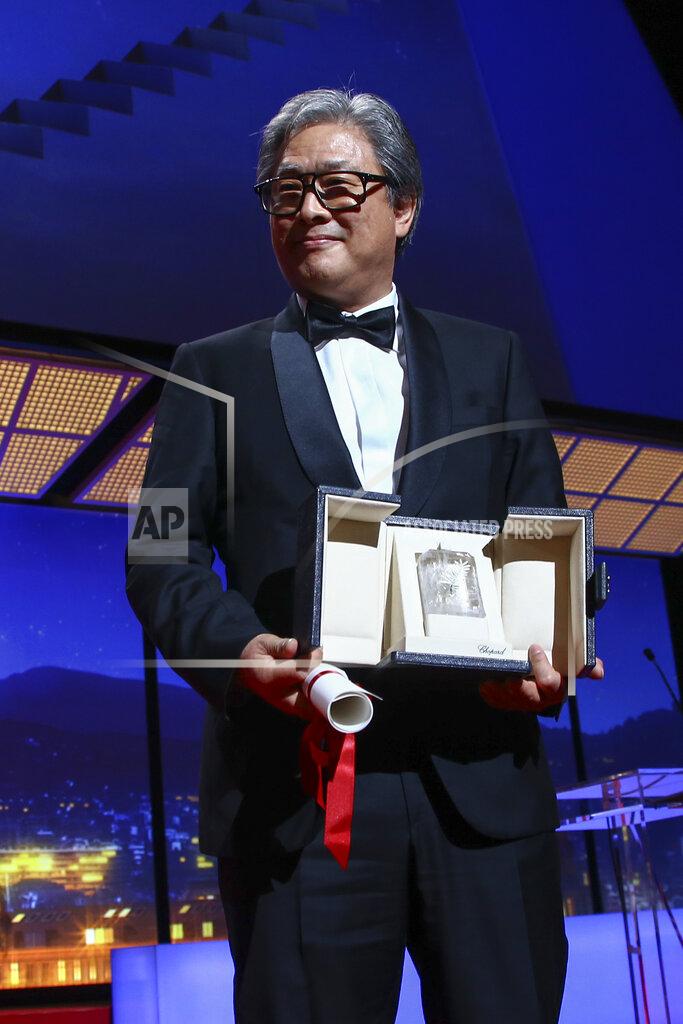 Joel C Ryan Director Park Chan-wook accepts the award for best director for 'Decision to Leave' during the awards ceremony of the 75th international film festival, Cannes, southern France, Saturday, May 28, 2022. (Photo by Joel C Ryan/Invision/AP)