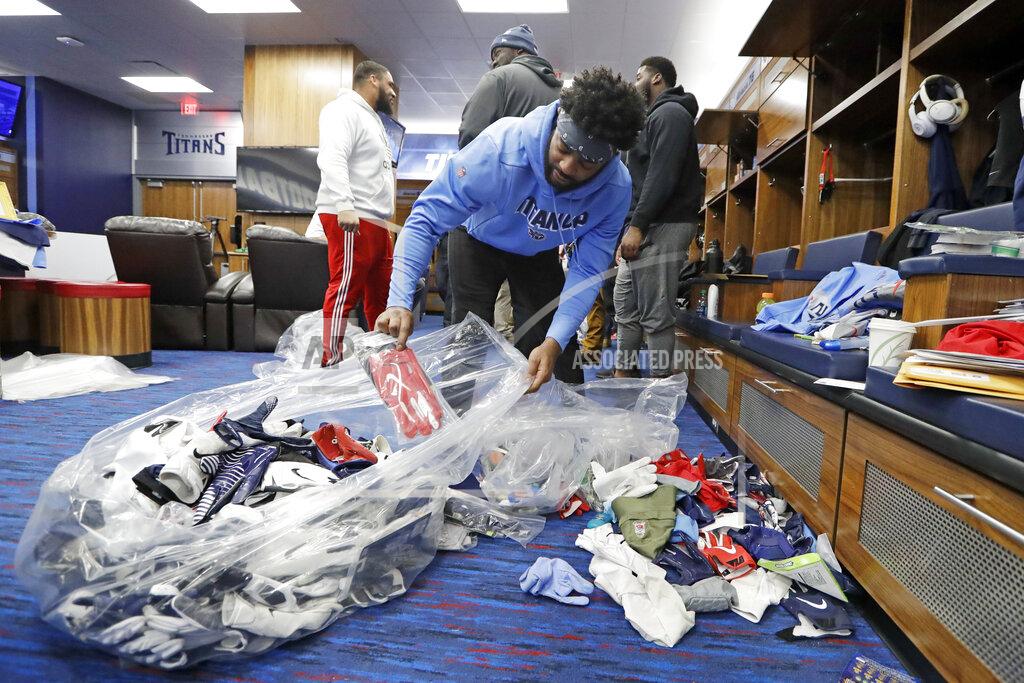 Mark Humphrey Tennessee Titans cornerback Malcolm Butler fills a bag with items as players clean out their lockers Monday, Jan. 20, 2020, in Nashville, Tenn. The Titans lost the AFC Championship NFL football game Sunday to the Kansas City Chiefs. (AP Photo/Mark Humphrey)