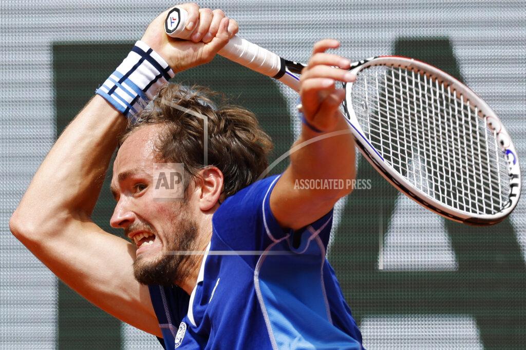Jean-Francois Badias Russia's Daniil Medvedev plays a shot against Serbia's Laslo Djere during their second round match at the French Open tennis tournament in Roland Garros stadium in Paris, France, Thursday, May 26, 2022. (AP Photo/Jean-Francois Badias)