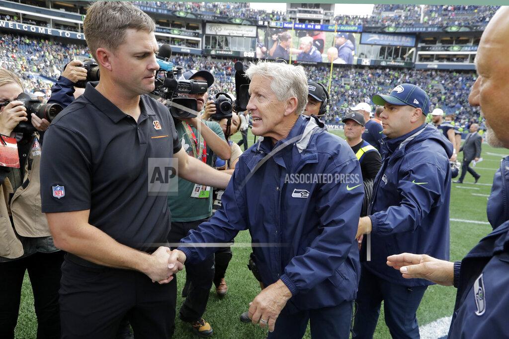 John Froschauer Seattle Seahawks head coach Pete Carroll, center, shakes hands with Cincinnati Bengals head coach Zac Taylor, left, after an NFL football game, Sunday, Sept. 8, 2019, in Seattle. (AP Photo/John Froschauer)