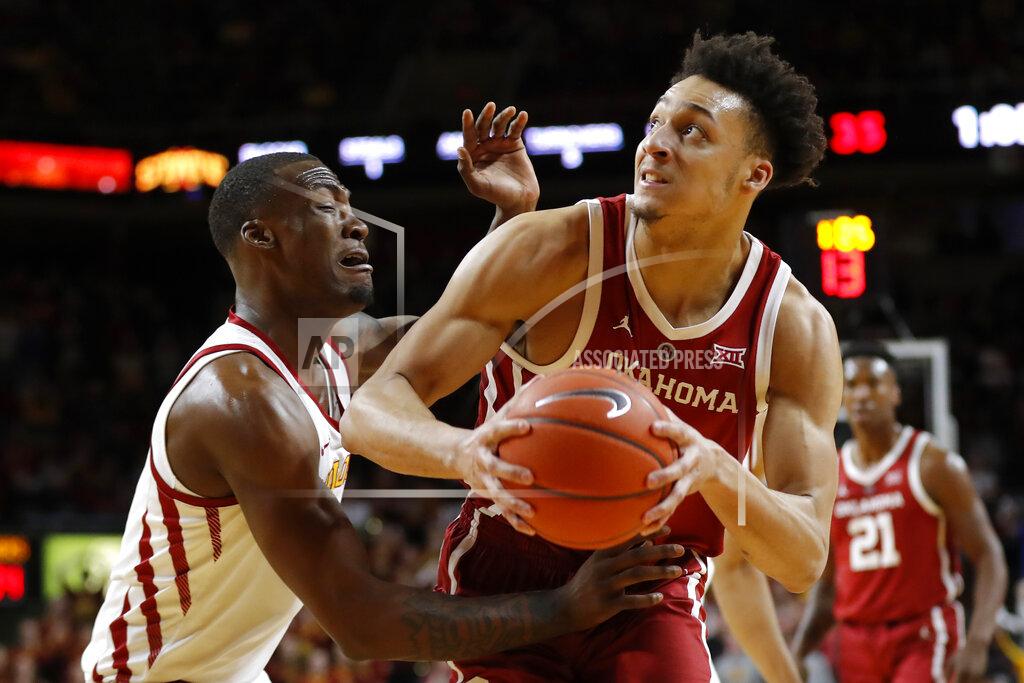 Charlie Neibergall Oklahoma center Jamuni McNeace drives past Iowa State forward Cameron Lard, left, during the first half of an NCAA college basketball game, Monday, Feb. 25, 2019, in Ames, Iowa. (AP Photo/Charlie Neibergall)