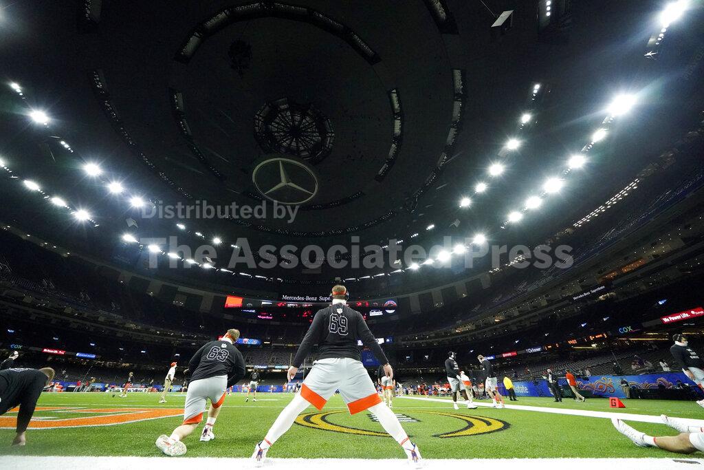Clemson warms up before the Sugar Bowl NCAA college football game against Ohio State Friday, Jan. 1, 2021, in New Orleans. (AP Photo/Gerald Herbert)