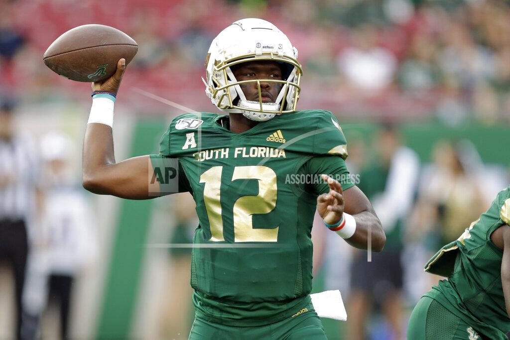 Chris O'meara South Florida quarterback Jordan McCloud fires a pass against Memphis during the first half of an NCAA college football game Saturday, Nov. 23, 2019, in Tampa, Fla. (AP Photo/Chris O'Meara)