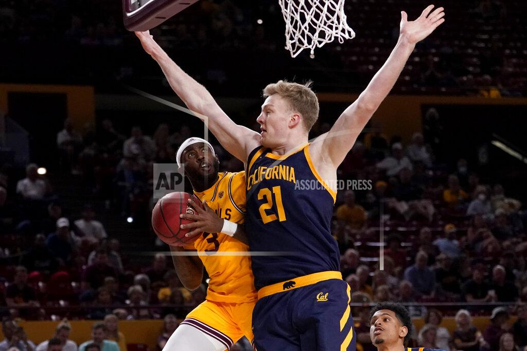 Matt York Arizona State guard Marreon Jackson (3) shoots as California forward Lars Thiemann (21)defends during the second half of an NCAA college basketball game, Thursday, March 3, 2022, in Tempe, Ariz. (AP Photo/Matt York)