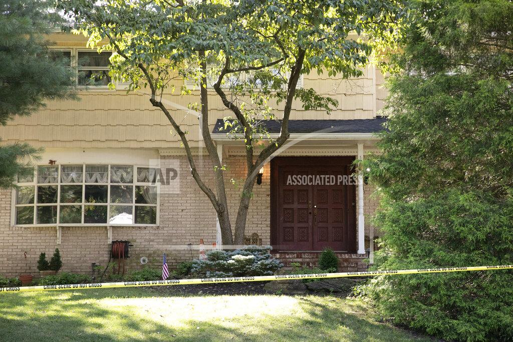 Mark Lennihan FILE - In this July 20, 2020, file photo, crime scene tape surrounds the home of U.S. District Judge Esther Salas, in North Brunswick, N.J. A gunman posing as a delivery person shot and killed Salas' 20-year-old son and wounded her husband Sunday evening at their New Jersey home before fleeing, according to judiciary officials. (AP Photo/Mark Lennihan, File)