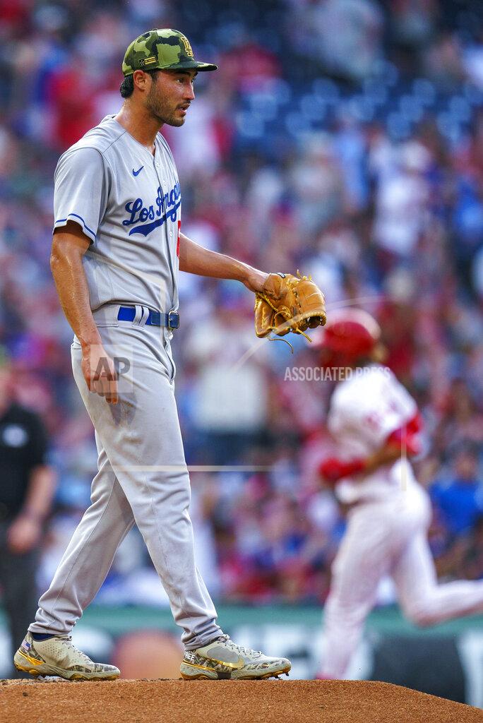 Chris Szagola Los Angeles Dodgers starting pitcher Mitch White stands on the mound as Philadelphia Phillies' Alec Bohm, right, rounds the bases after hitting a two-run home run during the third inning of a baseball game Saturday, May 21, 2022, in Philadelphia. (AP Photo/Chris Szagola)